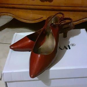 Red kitten heel pumps